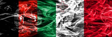 Afganistan vs Malta duman bayrakları yan yana yerleştirilmiş. Afgan ve Malta ipeksi duman bayrakları renkli kalın