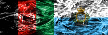 Afganistan vs San Marino duman bayrakları yan yana yerleştirilmiş. Afgan ve San Marino ipeksi duman bayrakları renkli kalın