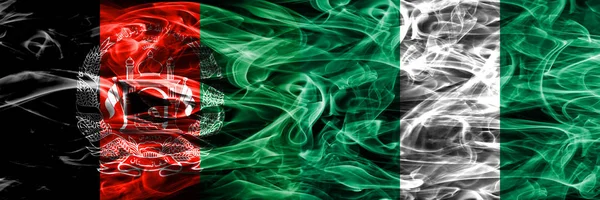 Afghanistan Nigeria Rauchfahnen Nebeneinander Platziert Dicke Seidige Rauchfahnen Aus Afghanistan — Stockfoto