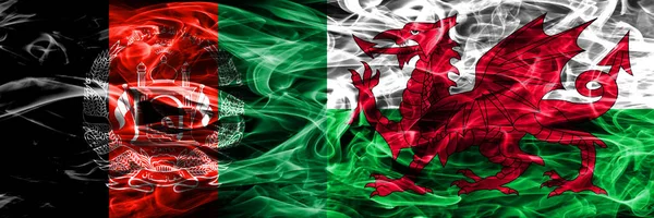 Afeganistão País Gales Bandeiras Fumaça Colocadas Lado Lado Bandeiras Fumaça — Fotografia de Stock
