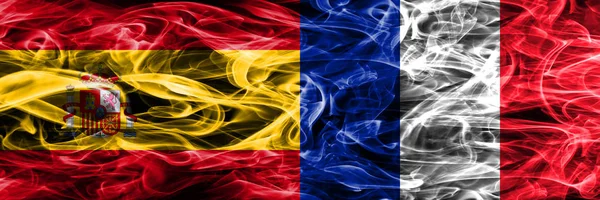 Испания Франция Дым Флаги Помещены Бок Бок Толстые Цветные Шелковистые — стоковое фото