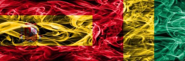 Spain Guinea Smoke Flags Placed Side Side Thick Colored Silky — Stock Photo, Image