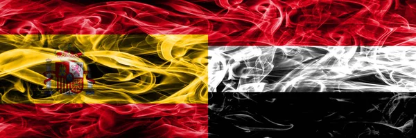 西班牙 也门烟旗并排放置 西班牙和也门厚颜色的丝质烟雾旗 — 图库照片