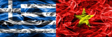 Yunanistan – Vietnam duman bayrakları yan yana yerleştirilmiş. Yunan ve Vietnam ipeksi duman bayrakları renkli kalın