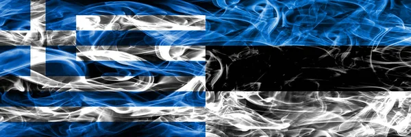 Греция Против Эстонии Курят Флаги Размещенные Бок Бок Толстые Шёлковые — стоковое фото