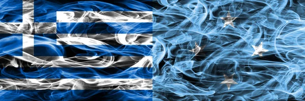 Греция Против Микронезии Дымовые Флаги Помещены Бок Бок Толстые Шёлковые — стоковое фото