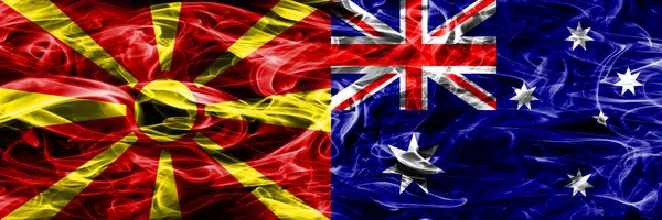 Македония Против Австралии Красочные Флаги Дыма Помещены Бок Бок — стоковое фото