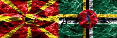 Makedonya vs Dominika renkli kavramı duman bayrakları yan yana yerleştirilmiş