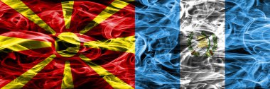 Makedonya vs Guatemala renkli kavramı duman bayrakları yan yana yerleştirilmiş