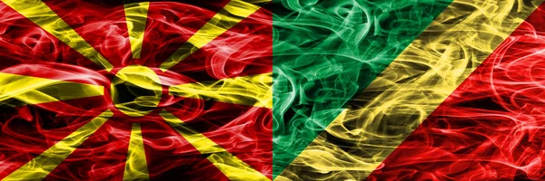 马其顿 刚果色彩缤纷的概念烟旗并排放置 — 图库照片