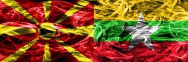 Makedonya vs Myanmar renkli kavramı duman bayrakları yan yana yerleştirilmiş