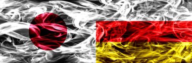 Japonya Rakip Güney Osetya duman bayrakları yan yana yerleştirilmiş