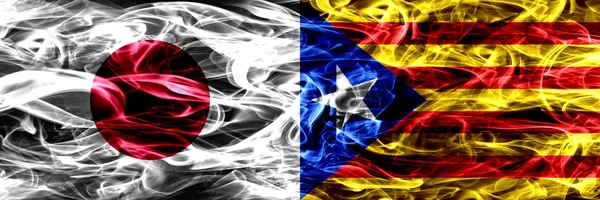 Япония Каталония Испания Дымит Флаги Установленные Бок Бок — стоковое фото