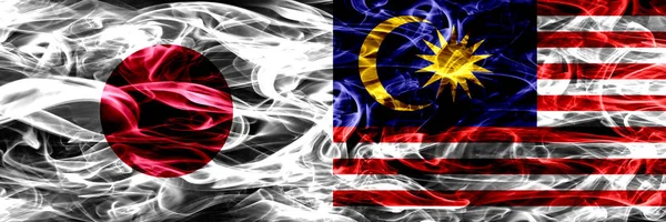 Japan Malaysia Malaysian Smoke Flags Placed Side Side — Stock Photo, Image