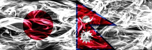 Giappone Nepal Bandiere Fumogene Nepalesi Affiancate — Foto Stock