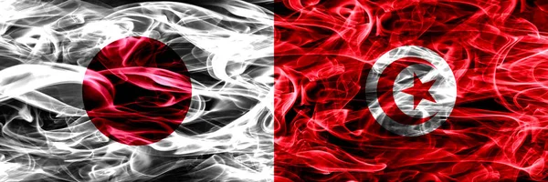 Japonia Tunezja Tunezyjski Dym Flagi Umieszczone Obok Siebie — Zdjęcie stockowe
