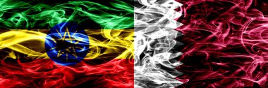 Etiyopya vs Katar, Katar renkli bayrakları yan yana yerleştirilmiş duman