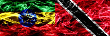 Etiyopya vs Trinidad ve Tobago renkli duman bayrakları yan yana yerleştirilmiş