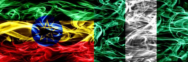 Αιθιοπία Νιγηρία Νιγηριανός Πολύχρωμο Καπνίζουν Σημαίες Που Τοποθετούνται Δίπλα Δίπλα — Φωτογραφία Αρχείου