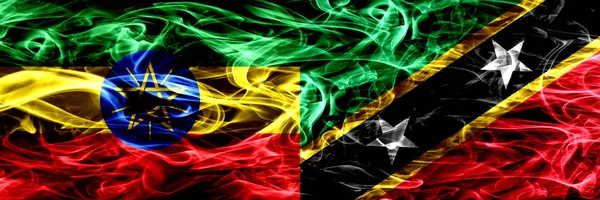 Etiyopya vs Saint Kitts ve Nevis renkli duman bayrakları yan yana yerleştirilmiş