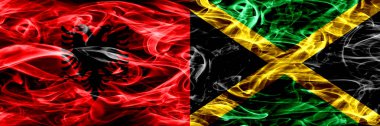 Arnavutluk Rakip Jamaika, Jamaika bayrakları yan yana yerleştirilmiş duman. Kalın ipeksi duman bayrak Arnavutça ve Jamaika, Jamaika, renkli
