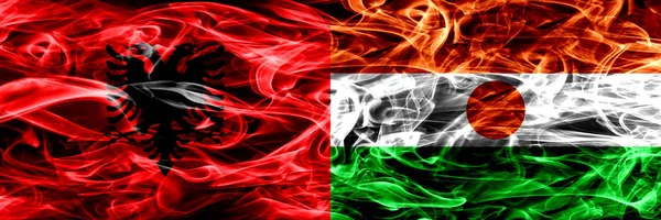 Albania Niger Nigerian Smoke Flags Placed Side Side Thick Colored — Stock Photo, Image