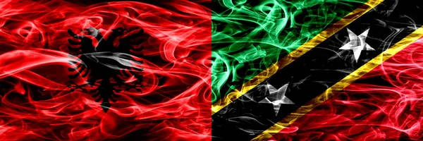 Albânia São Cristóvão Nevis Bandeiras Fumaça Colocadas Lado Lado Bandeiras — Fotografia de Stock