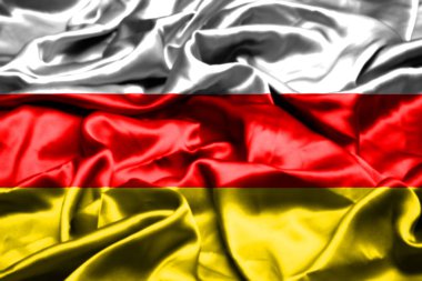 Güney Osetya bayrak rüzgarda sallayarak