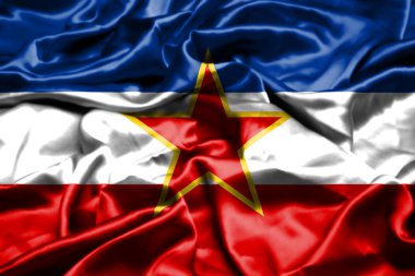 Rüzgarda sallayarak Yugoslavya bayrağı