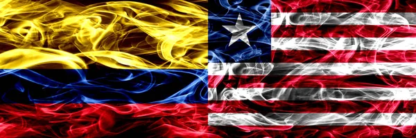 Colômbia Libéria Bandeiras Fumaça Liberiana Colocadas Lado Lado Bandeiras Fumaça — Fotografia de Stock