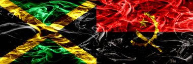Jamaika vs Angola, Angola bayrakları yan yana yerleştirilmiş duman. Kalın ipeksi duman bayrak Jamaika ve Angola, Angola, renkli