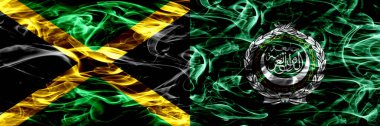 Jamaika vs Arap Birliği bayrakları yan yana yerleştirilmiş duman. Jamaika ve Arap Ligi ipeksi duman bayrakları renkli kalın