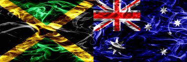 Jamaika vs Avustralya, Avustralya bayrakları yan yana yerleştirilmiş duman. Kalın ipeksi duman bayrak Jamaika ve Avustralya, Avustralya, renkli
