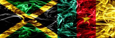 Jamaika vs Kamerun, Kamerunlu bayrakları yan yana yerleştirilmiş duman. Kalın ipeksi duman bayrakları Jamaika ve Kamerun, Kamerunlu renkli