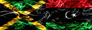 Jamaika vs Libya, Libya bayrakları yan yana yerleştirilmiş duman. Kalın ipeksi duman bayrak Jamaika ve Libya, Libya, renkli