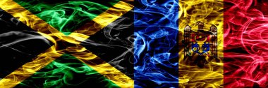 Jamaika vs Moldova, Moldova bayrakları yan yana yerleştirilmiş duman. Kalın ipeksi duman bayrak Jamaika ve Moldova, Moldova, renkli