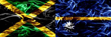Jamaika vs Nauru duman bayrakları yan yana yerleştirilmiş. Jamaika ve Nauru ipeksi duman bayrakları renkli kalın