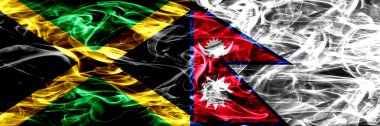 Jamaika vs Nepal, Nepal bayrakları yan yana yerleştirilmiş duman. Kalın ipeksi duman bayrak Jamaika ve Nepal, Nepal, renkli