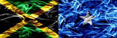 Jamaika vs Somali, Somalili bayrakları yan yana yerleştirilmiş duman. Kalın ipeksi duman bayrakları Jamaika ve Somali, Somalili renkli