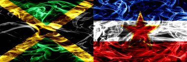 Jamaika vs Yugoslavya duman bayrakları yan yana yerleştirilmiş. Jamaika ve Yugoslavya ipeksi duman bayrakları renkli kalın