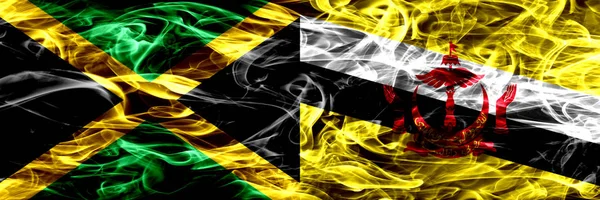 Jamaika vs Brunei, Brunei bayrakları yan yana yerleştirilmiş duman. Kalın ipeksi duman bayrak Jamaika ve Brunei, Brunei, renkli