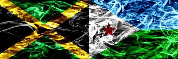 Jamaika vs Cibuti duman bayrakları yan yana yerleştirilmiş. Jamaika ve Cibuti ipeksi duman bayrakları renkli kalın