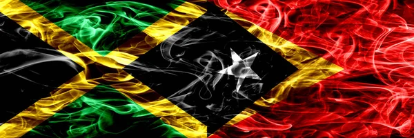 Jamaica Østtimor Røg Flag Placeret Side Side Tykke Farvede Silkeagtig - Stock-foto