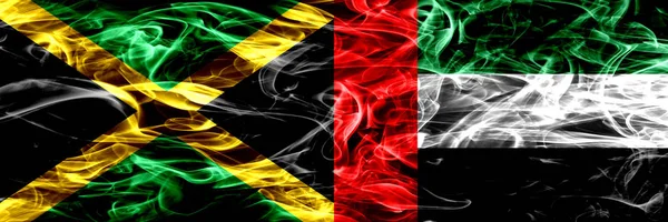 Τζαμάικα Ηνωμένα Αραβικά Εμιράτα Εμιράτα Καπνίζουν Σημαίες Που Τοποθετούνται Δίπλα — Φωτογραφία Αρχείου