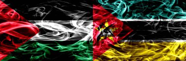 Palestine vs Mozambik, Mozambik bayrakları yan yana yerleştirilmiş duman. Kalın ipeksi duman bayrak Filistin ve Mozambik, Mozambik, renkli