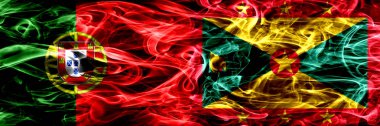 Portekiz vs Grenada duman bayrakları yan yana yerleştirilmiş. Portekizce ve Grenada ipeksi duman bayrakları renkli kalın