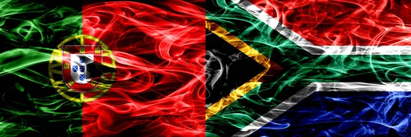 Португалия Против Южной Африки Африканские Дымовые Флаги Помещены Бок Бок — стоковое фото