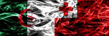 Cezayir, Cezayir vs Tonga, Tongan bayrakları yan yana yerleştirilmiş duman. Kavram ve fikir bayrakları mix