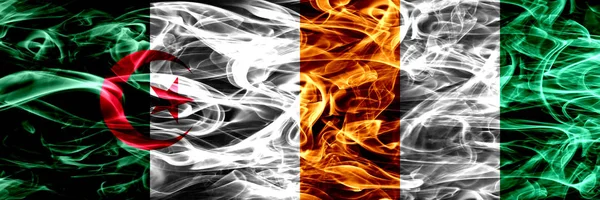 Algeriet Algeriska Elfenbenskusten Röker Flaggor Placeras Sida Vid Sida Koncept — Stockfoto