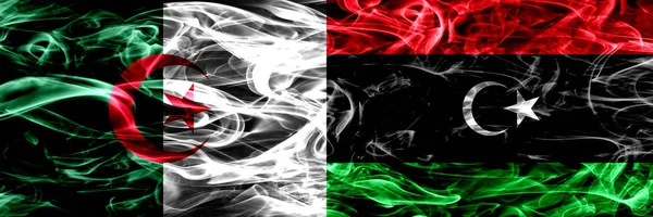 阿尔及利亚 阿尔及利亚 利比亚 利比亚的烟雾旗并排放置 概念和想法标志混合 — 图库照片